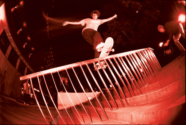Cale Nuske nollie front boards a shiny, well-supported rail.